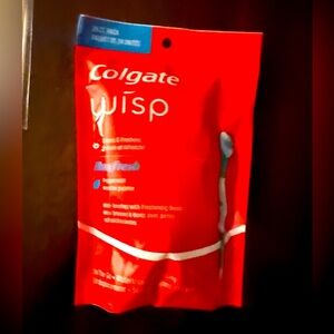 Never been opened 24 pack of Colgate Wisp disposable toothbrushes